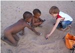 Markham playing with San kids